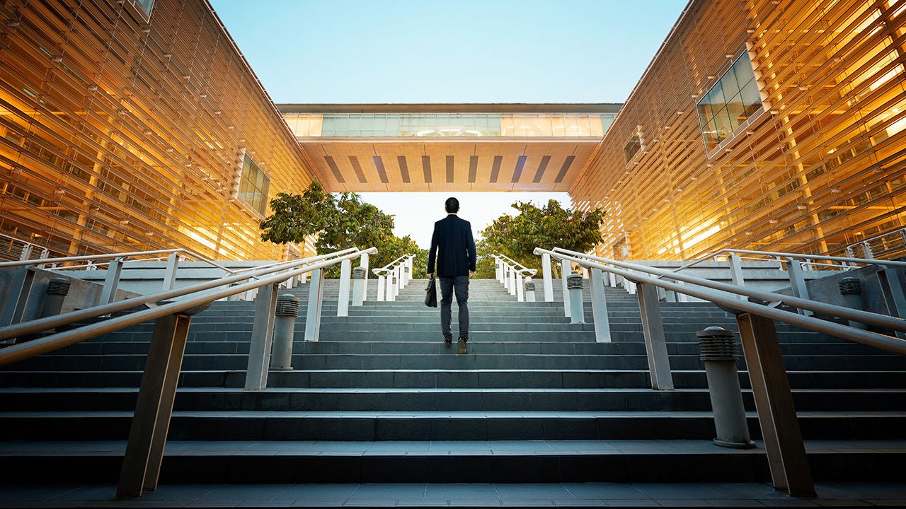 Man scaling stairs