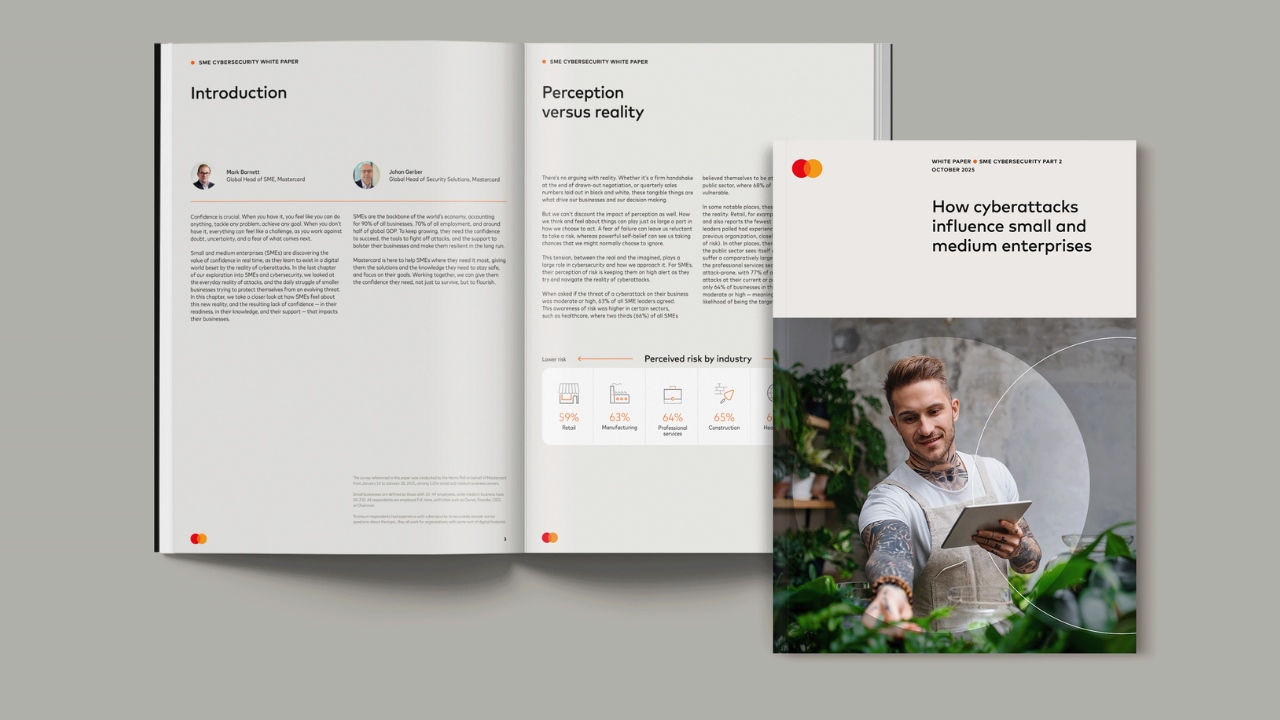 White paper cover and opened to a page. 