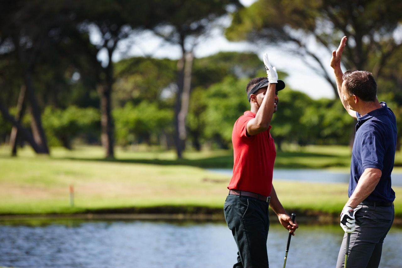 two golfers celebrating