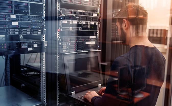 Man maintaining a server