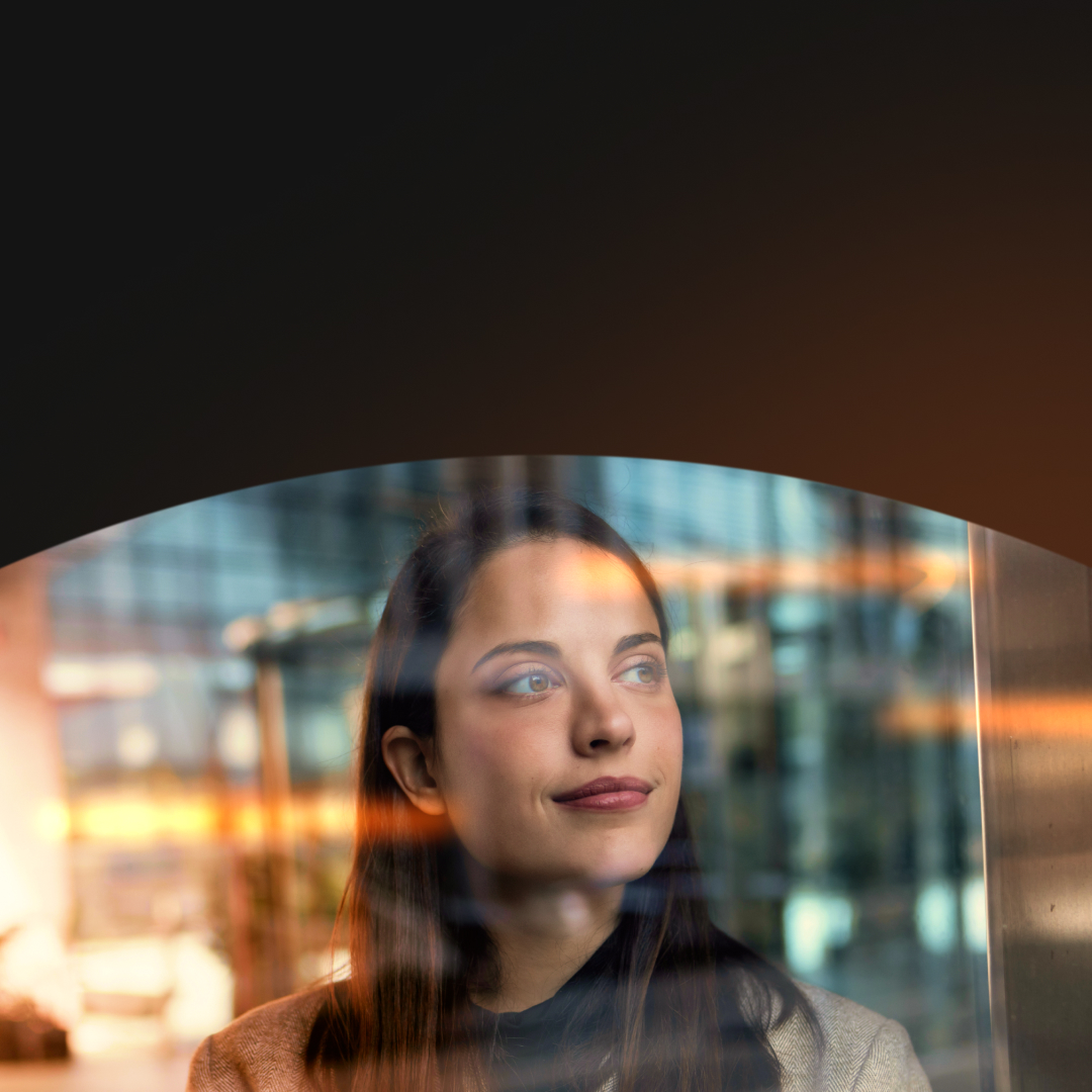 Woman gazing out of a window