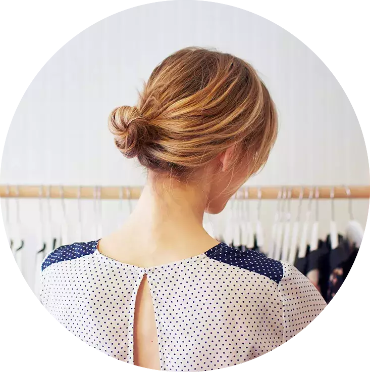 woman looking at clothing rack inside mastercard logo silhouette