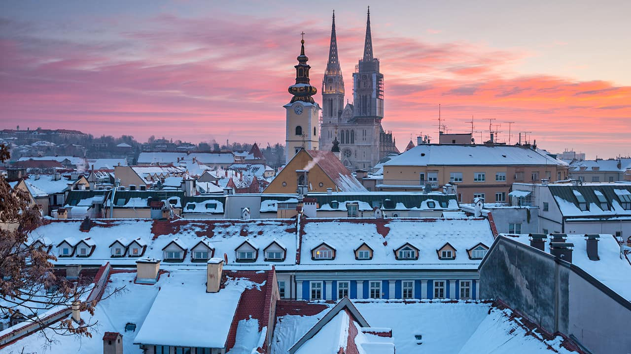 snowy zagreb rooftops at sunrise