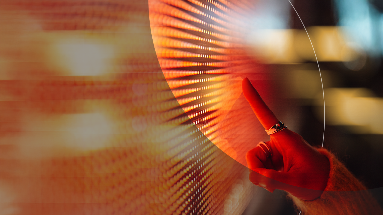 Close up of woman hand touching bright screen.
