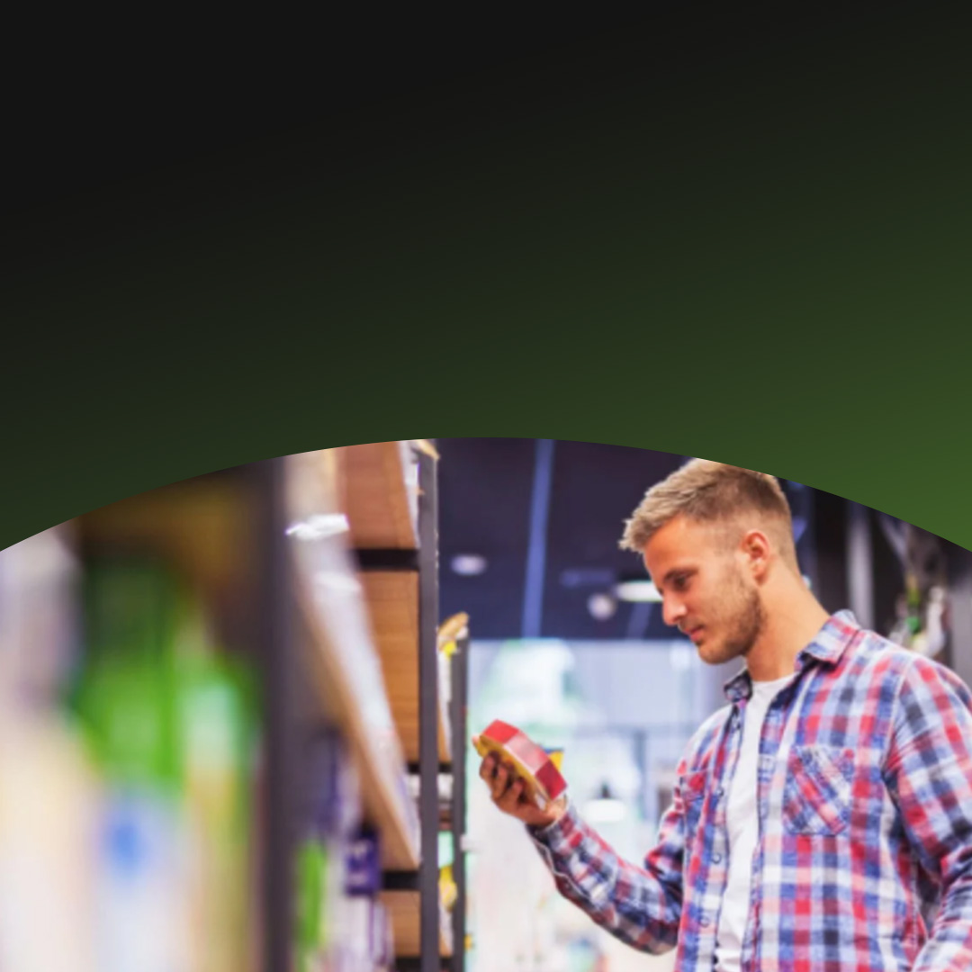 Young man looking at product in warehouse store