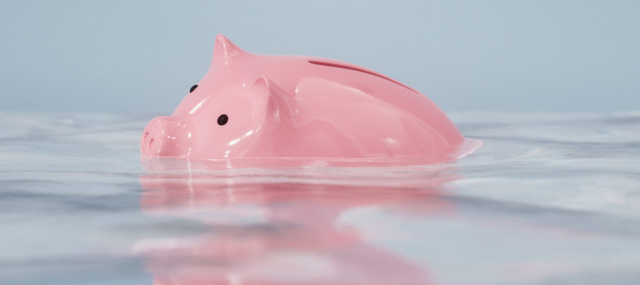 Sinking piggy bank