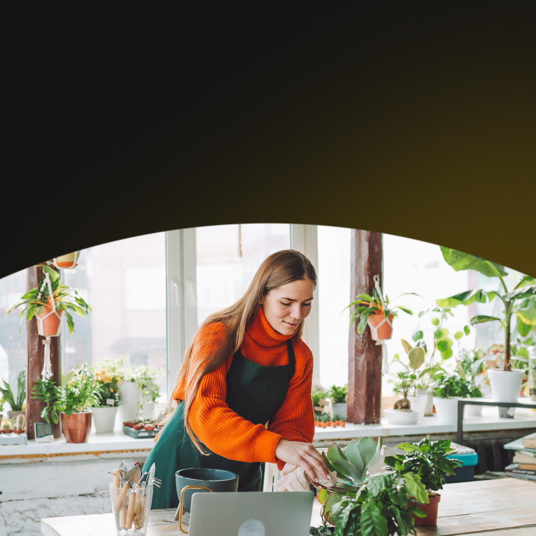 Woman working on plants