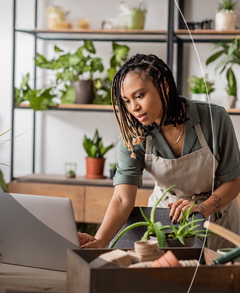 Family posing for picture in the driveway of their home.