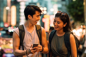 A man and woman walking down a street