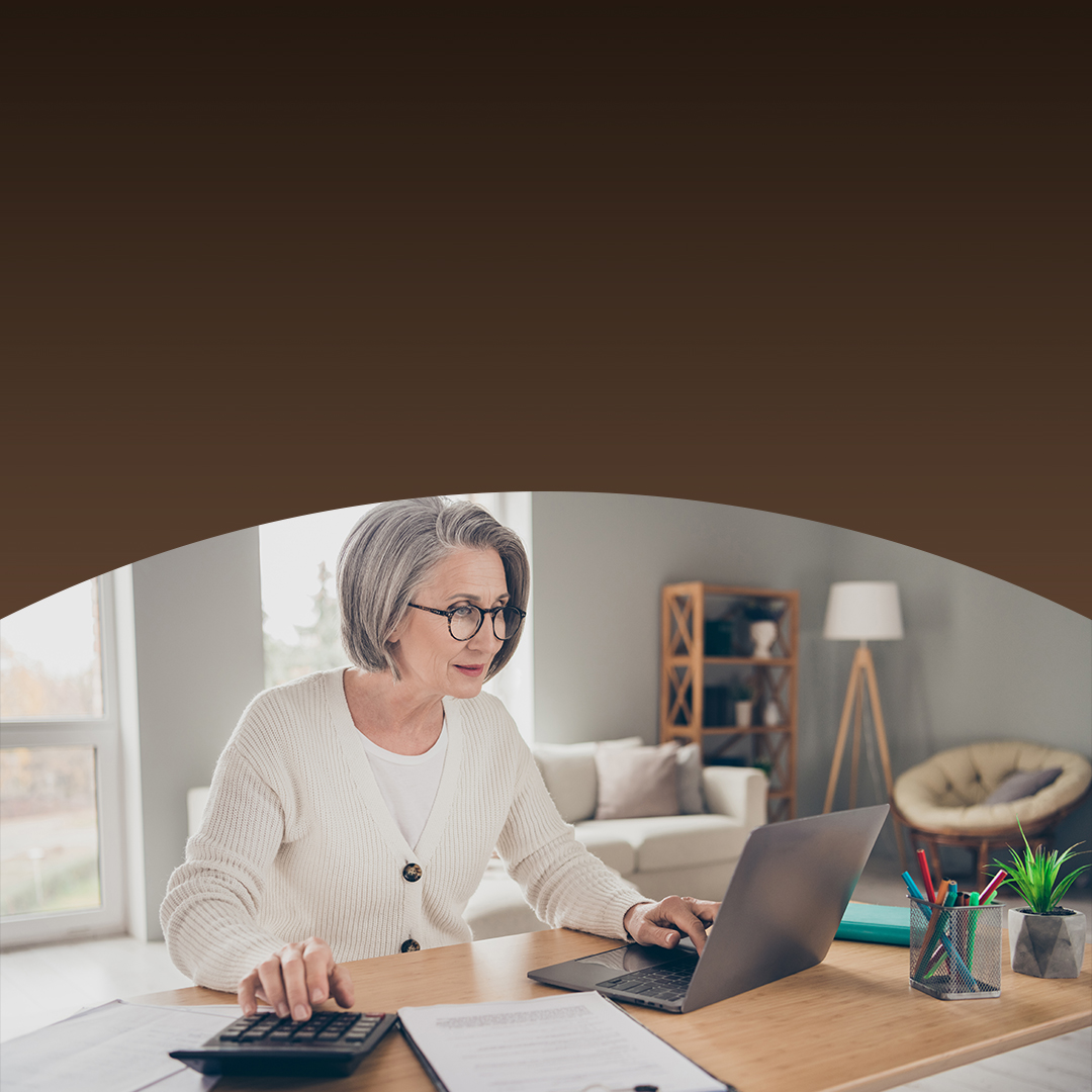 senior lady accountant dressed white cardigan counting bills