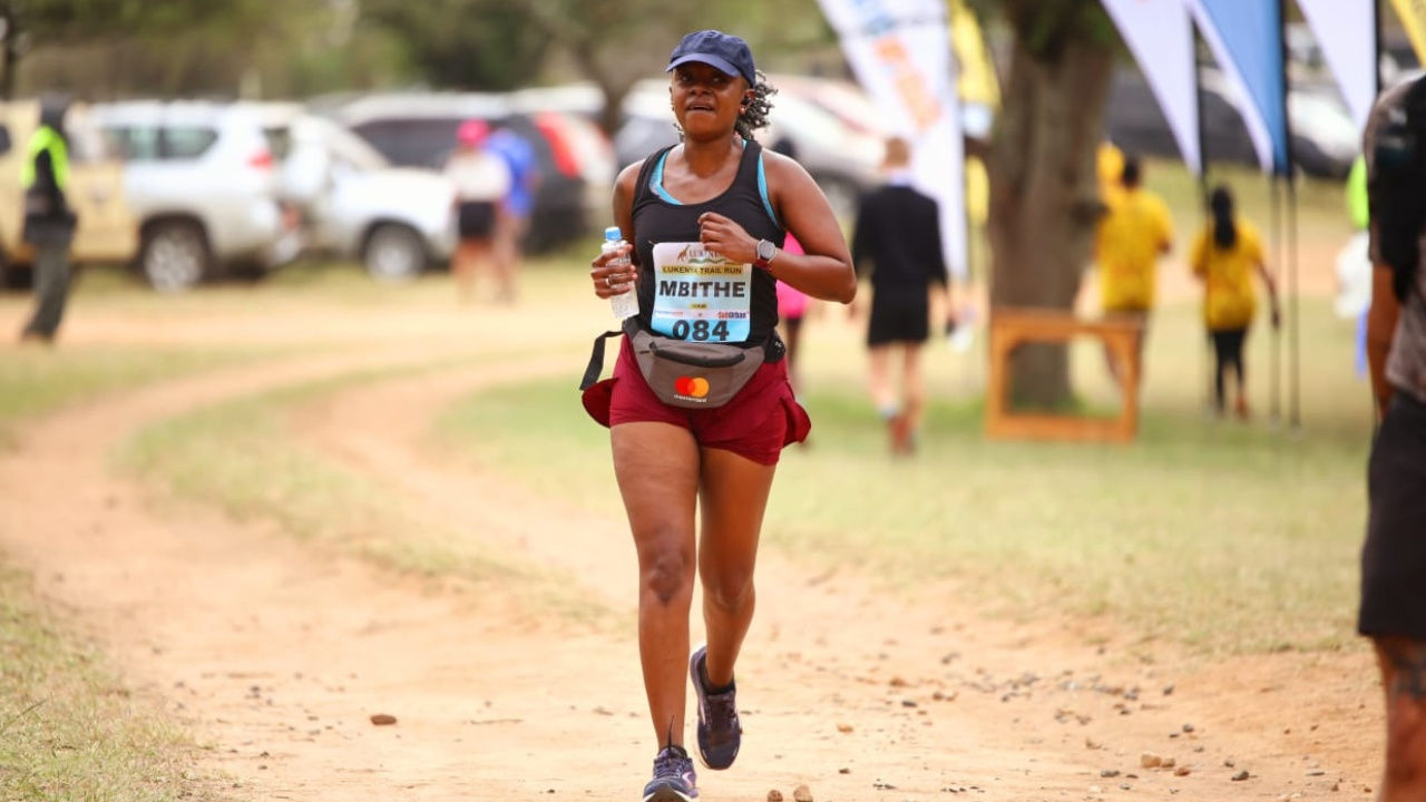 June Muli runs a marathon. 