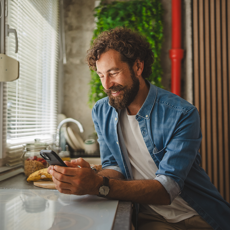 Man checking his email on his phone