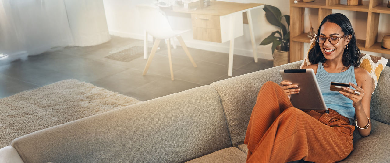 Mother and child looking at laptop.