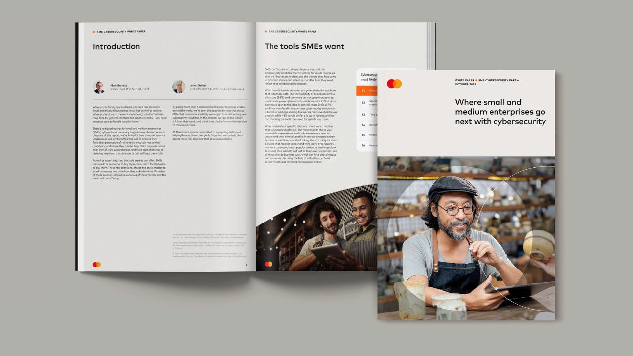 White paper cover and opened to a page. 