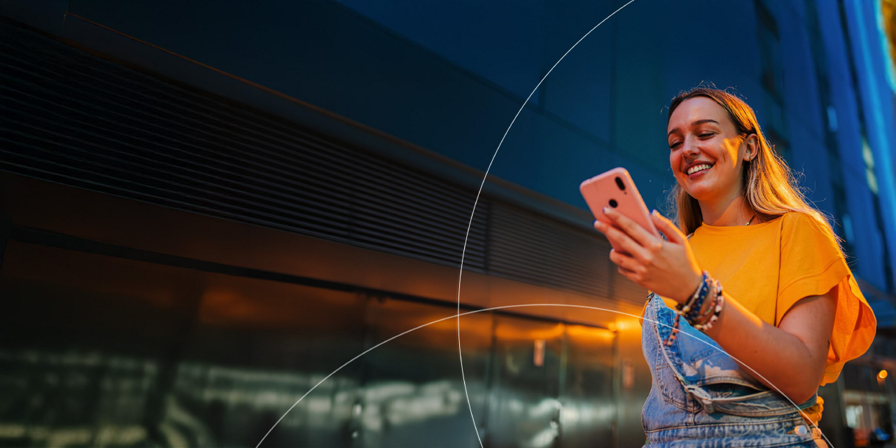 Woman making payment on her phone.