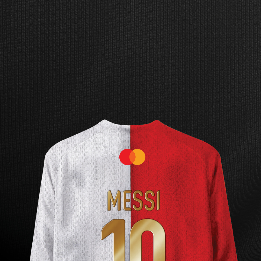 Back view of a half-white and half-red soccer jersey featuring the Mastercard logo, with "MESSI" and the number "10" in a metallic gold font, set against a dark textured background.
