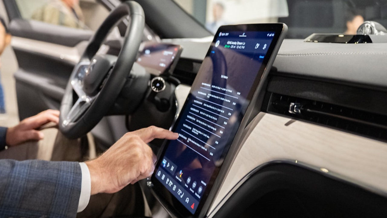 A Volvo owner enters credential details for in-car payments. 