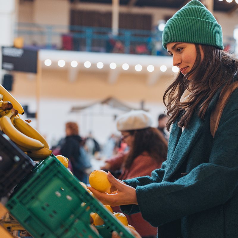 Woman shopping for fruit