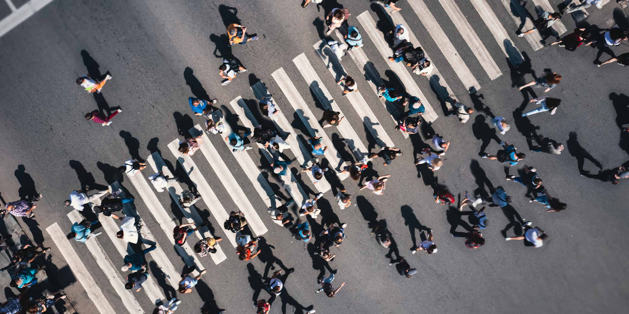 Group of people crossing the street