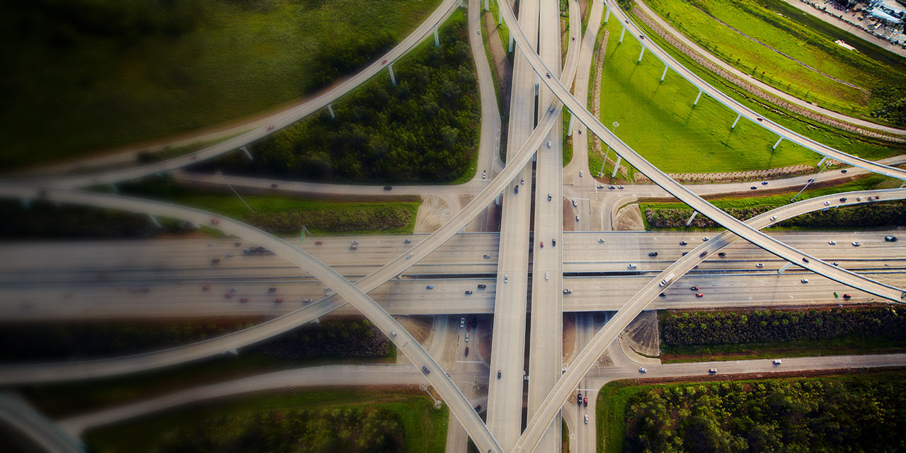 Top down view of flyovers with cars.