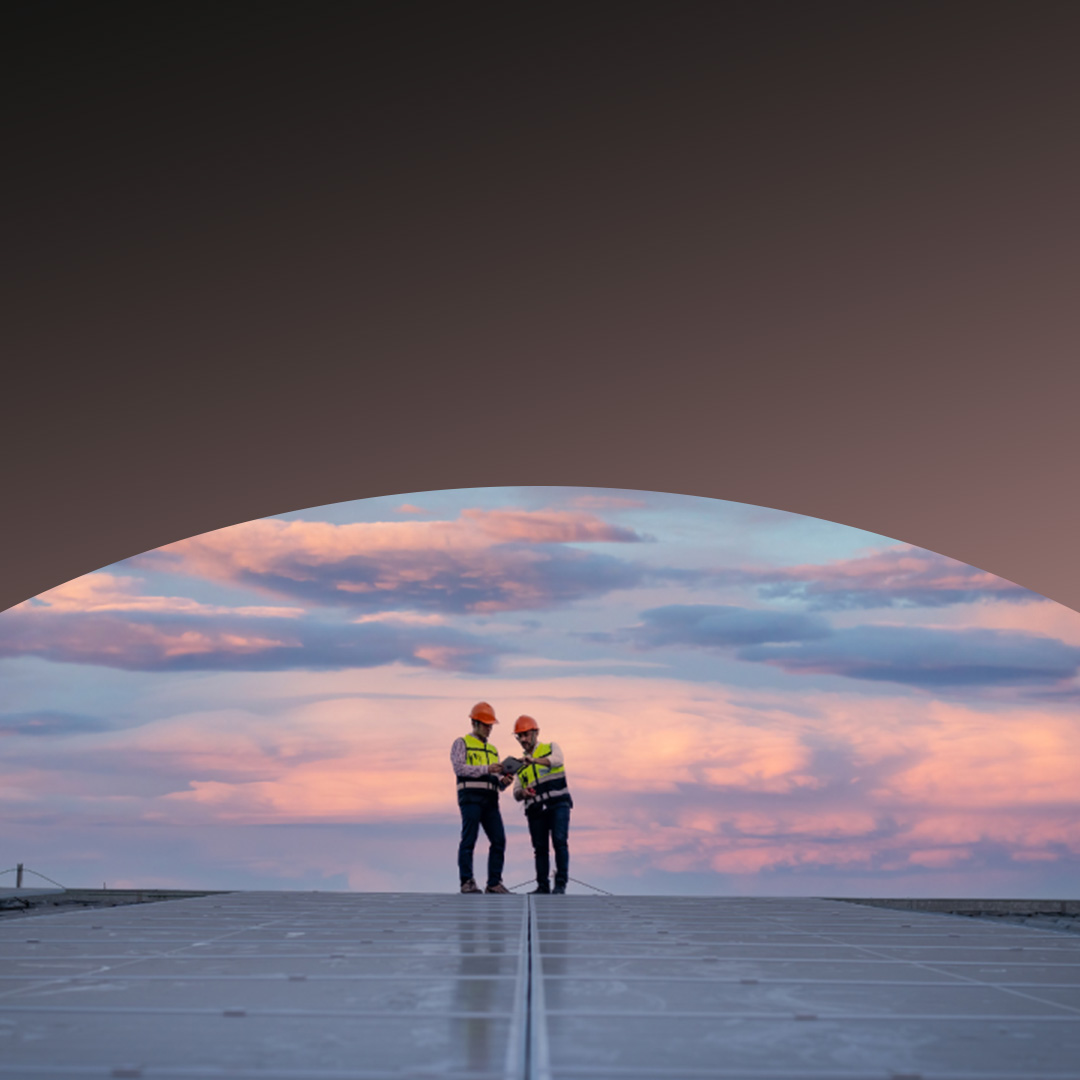 Two workers wearing hard hats