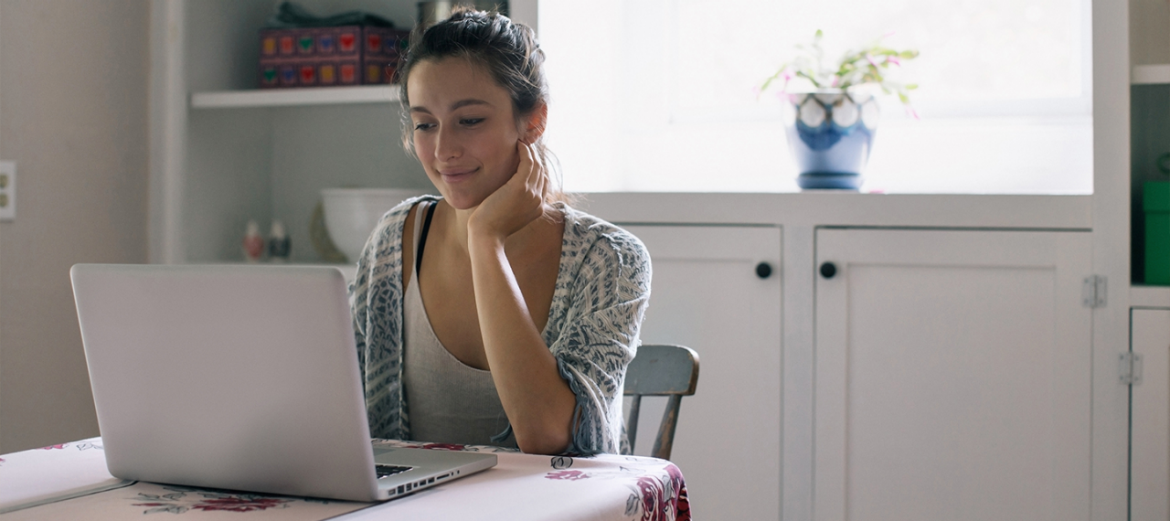 Woman looking at computer