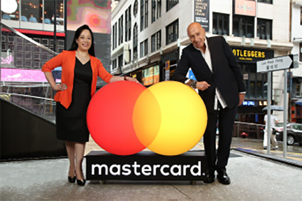 Helena Chen, managing director, Hong Kong and Macau, Mastercard, and Allan Zeman, chairman, Lan Kwai Fong Association, celebrating their partnership to bring local and overseas Mastercard cardholders a wide array of exclusive privileges and unique dining experiences in some of the best bars and restaurants in Lan Kwai Fong.