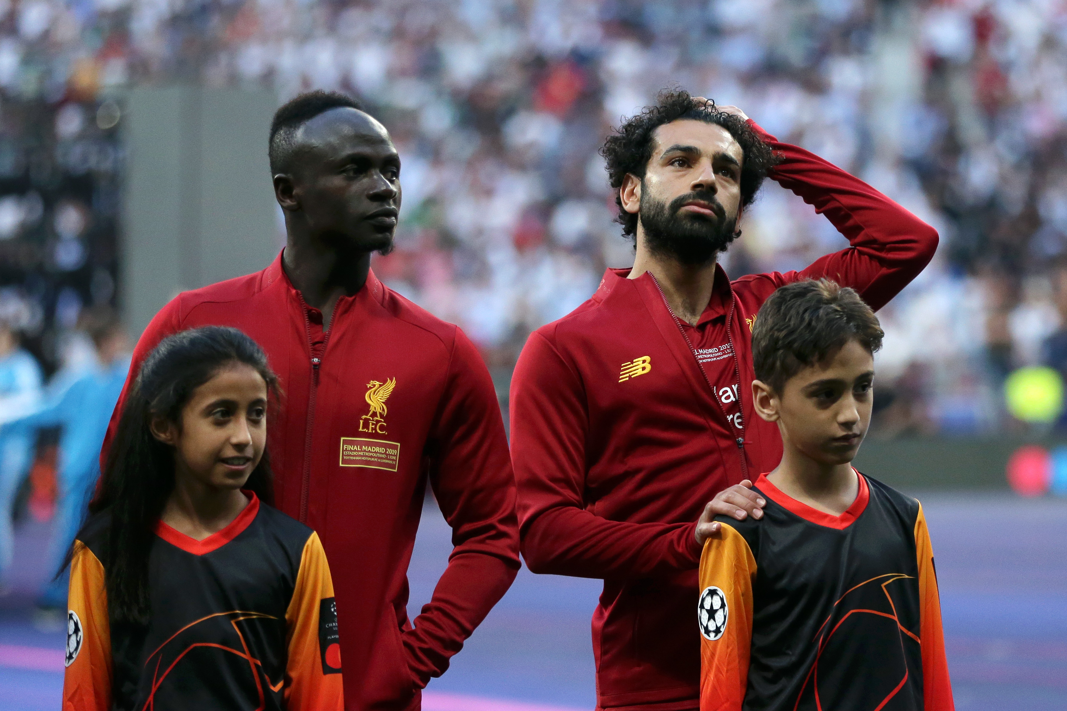 MADRID, SPAIN - JUNE 01:  Sadio Mane and Mohamed Salah of Liverpool look on prior to the UEFA Champions League Final between Tottenham Hotspur and Liverpool at Estadio Wanda Metropolitano on June 01, 2019 in Madrid, Spain. (Photo by Gonzalo Arroyo - UEFA/UEFA via Getty Images)