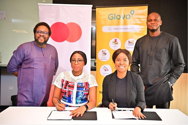 (L-R): Akintunde Ajayi, Director, Business Development, Fintech & Enablers, EEMEA, Mastercard; Folasade Femi-Lawal, Country Manager, West Africa, Mastercard; Lamide Akinola, General Manager, Glovo Nigeria; and Kolawole Adeniyi, Head of Q-commerce, Glovo Nigeria, commemorate their agreement to provide over 300,000 meals for school children in Nigeria and Kenya.