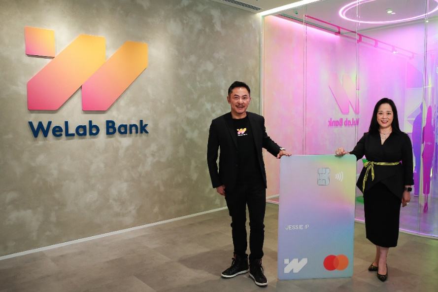Helena Chen, Managing Director, Hong Kong and Macau, Mastercard, and Adrian Tse, Chief Executive of WeLab Bank, join hands to announce the launch of the numberless Debit Card to provide a simple, intuitive, customer-centric and fully digital banking experience, which caters to the tech-savvy needs and lifestyles of people all over Hong Kong.