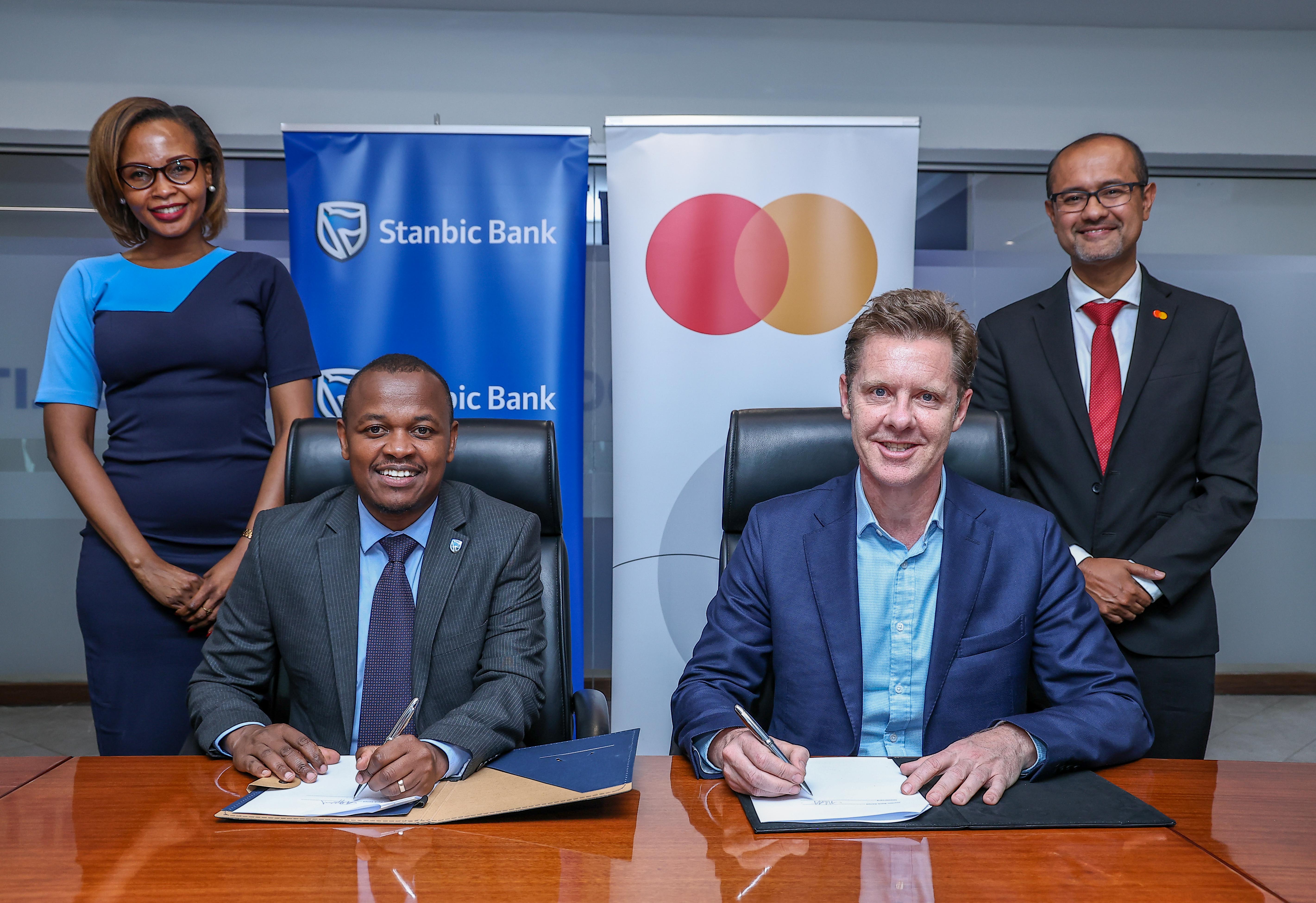 From Left: Doreen Ratemo, Head of Affluent Clients Wealth & Investments, Stanbic Bank; Abraham Ongenge, Head of Private and Personal Banking, Stanbic Bank; Mark Elliott, Division President, Africa, Mastercard; and Shehryar Ali, SVP and Country Manager for East Africa and Indian Ocean Islands, Mastercard during the official partnership signing of the Stanbic World and Stanbic World Elite Premium metallic cards in partnership with Mastercard.