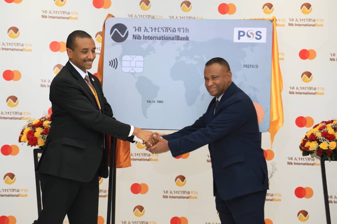 Henok Kebede, CEO of NIB International Bank (L) and Elfagid Woldegiorgis, Business Development Director for Ethiopia, Somalia, and Sudan at Mastercard (R) launch of the NIB International Bank Prepaid Mastercard in Ethiopia.