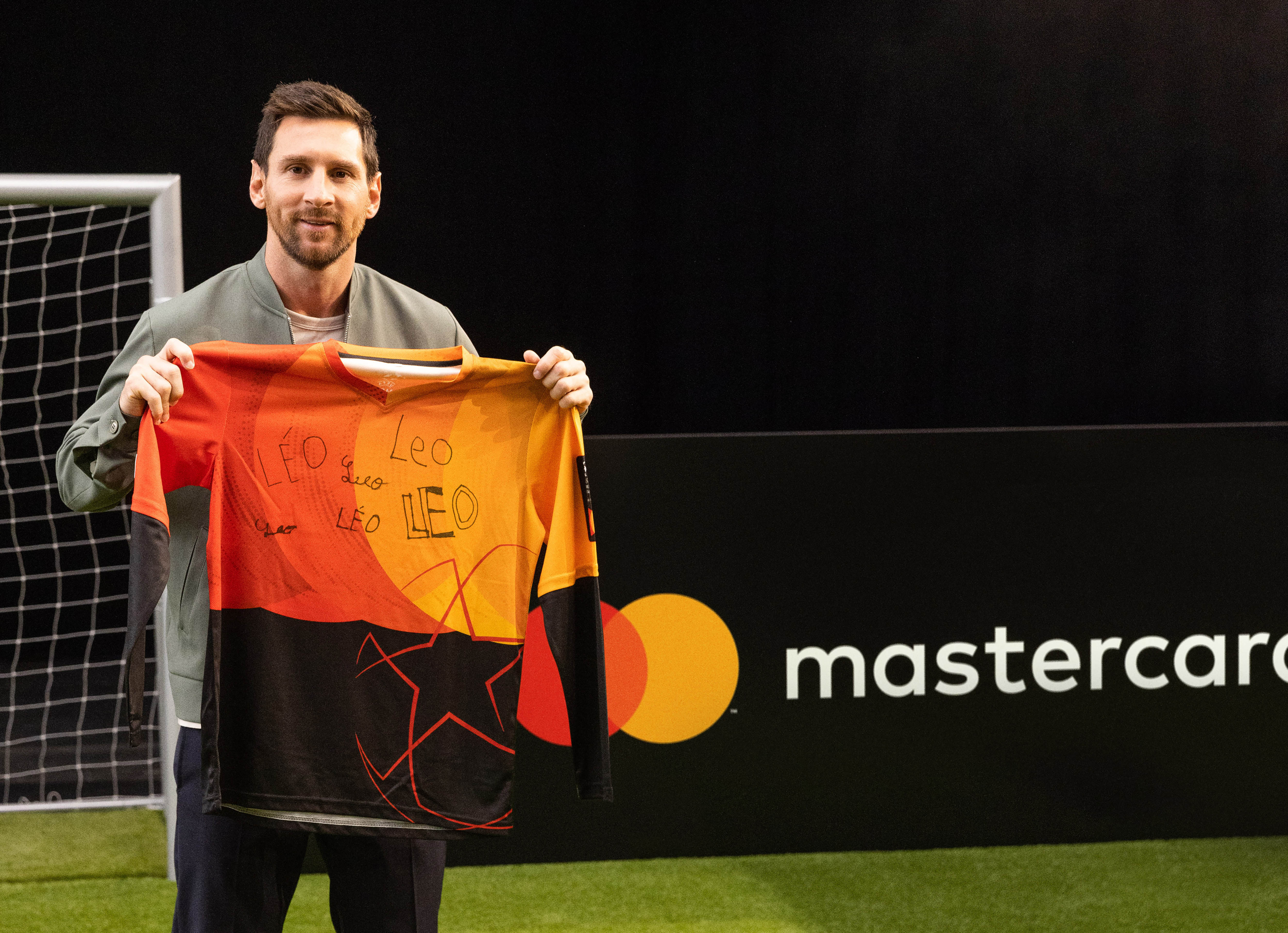 Lionel Messi unveils Mastercards new UEFA Champions League mascot kit Mastercard Newsroom