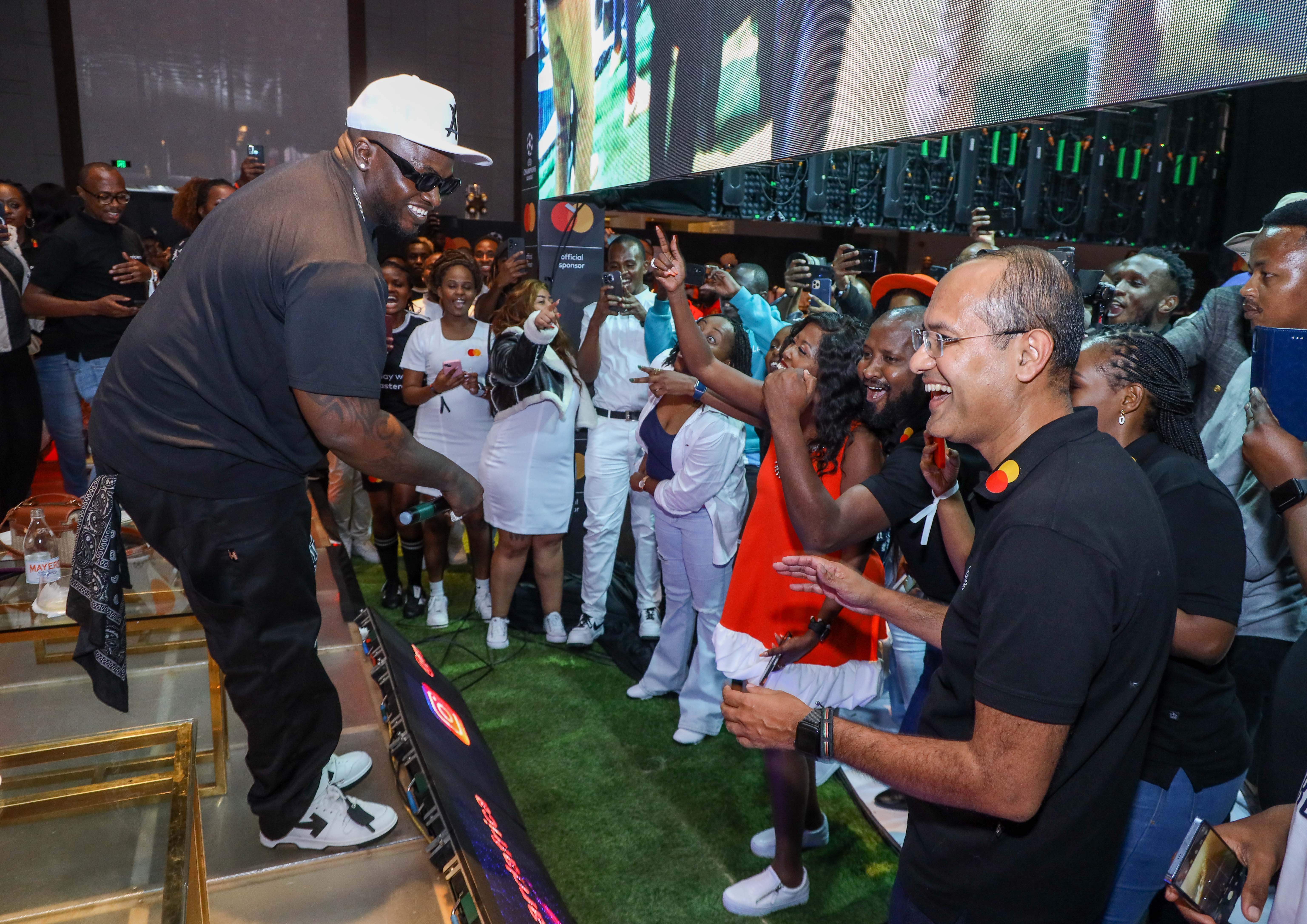 Celebrated Kenyan rapper Khaligraph Jones electrifies the stage at the UEFA Champions League Finals viewing event hosted by Mastercard in Nairobi.