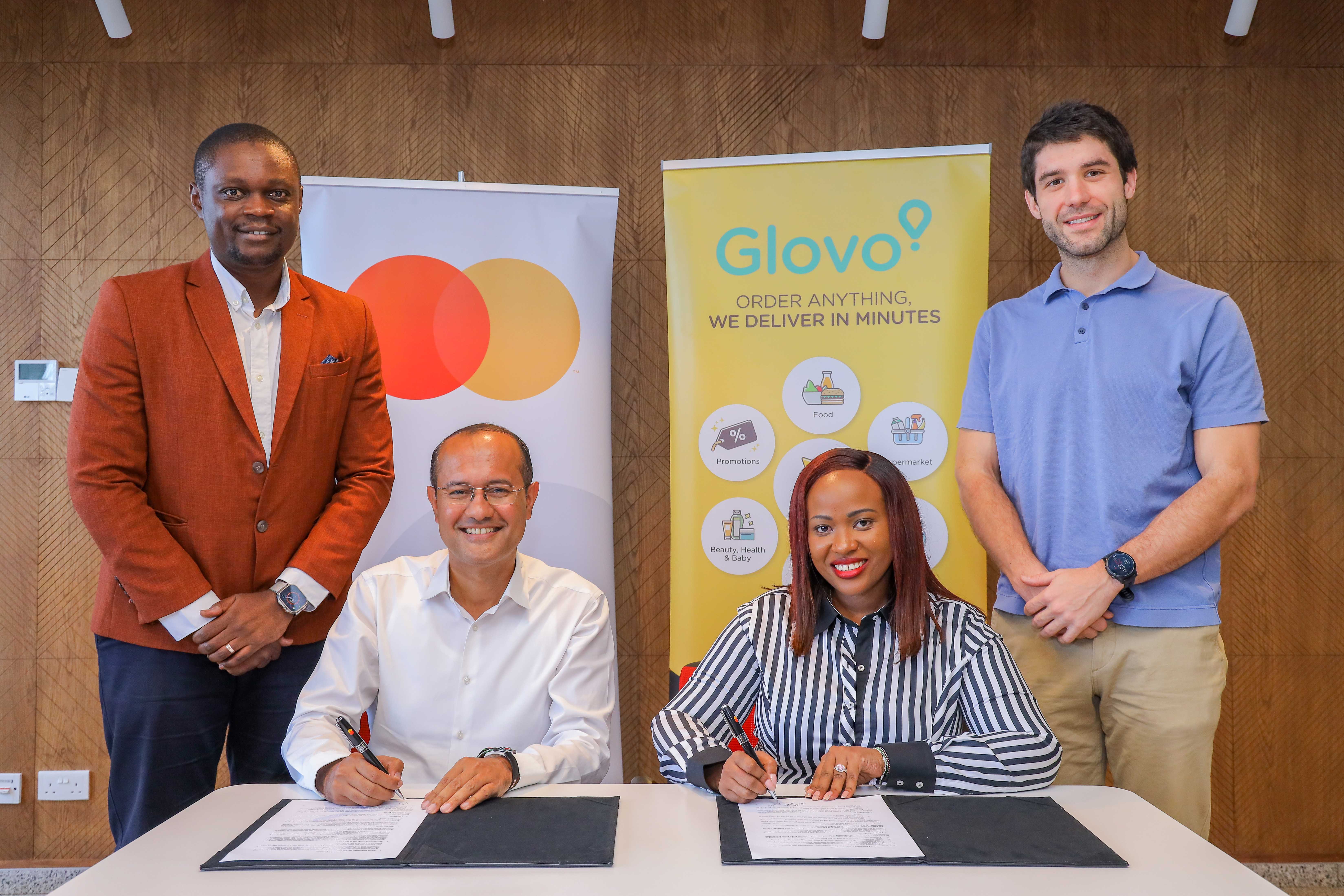 (L-R): Lenin Sembo Oyuga, Head of Telco Digital Partnerships in Middle East and Africa at Mastercard; Shehryar Ali, Senior Vice President and Country Manager for East Africa and Indian Ocean Islands at Mastercard; Caroline Mutuku, General Manager at Glovo Kenya; and Lorenzo Mayol, Partners and Brands Advertising Director at Glovo Africa commemorate their agreement to provide over 300,000 meals for school children in Kenya and Nigeria.