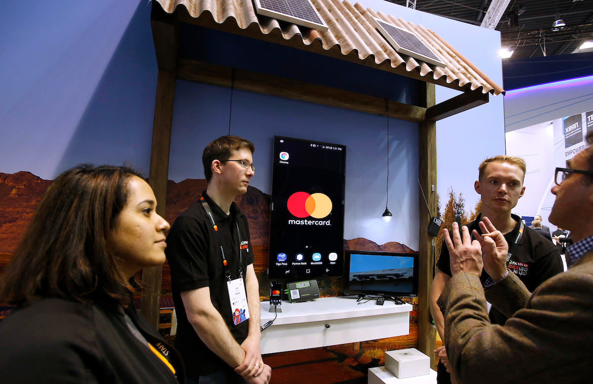 IMAGE DISTRIBUTED FOR MASTERCARD - IoT in action as Mastercard and M-KOPA announce partnership to light up homes and payments at the 2018 Mobile World Congress on Monday, Feb. 26, 2018 in Barcelona, Spain. (Manu Fernandez/AP Images for Mastercard)
