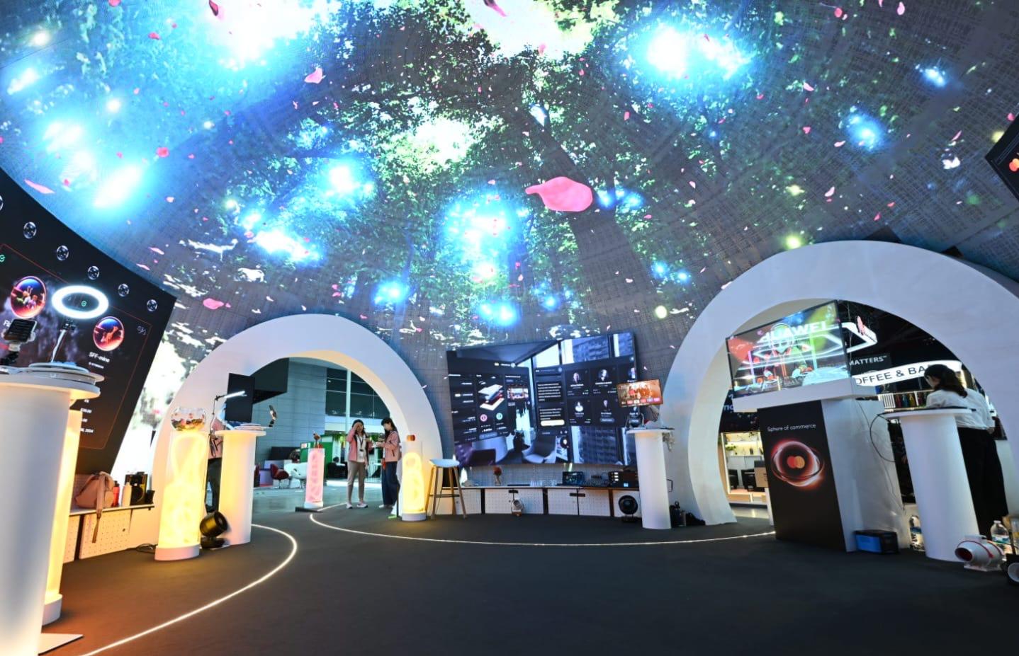 The ceiling of the Mastercard booth at the Singapore Fintech Festival, upon which there are abstract projections.