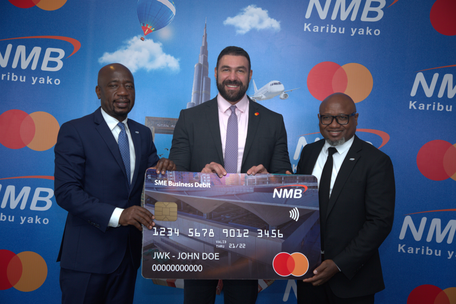 (L-R): Filbert Mponzi, Chief of Retail Banking at NMB Bank Plc; Ali Wehbe, Vice President, Specialist Sales, Small and Medium Enterprises, EEMEA at Mastercard; and Manfredy Kayala, Senior Manager, Issuing Card Business at NMB Bank Plc, during the launch of the NMB Business Debit Traders card in Dar es Salaam, Tanzania.