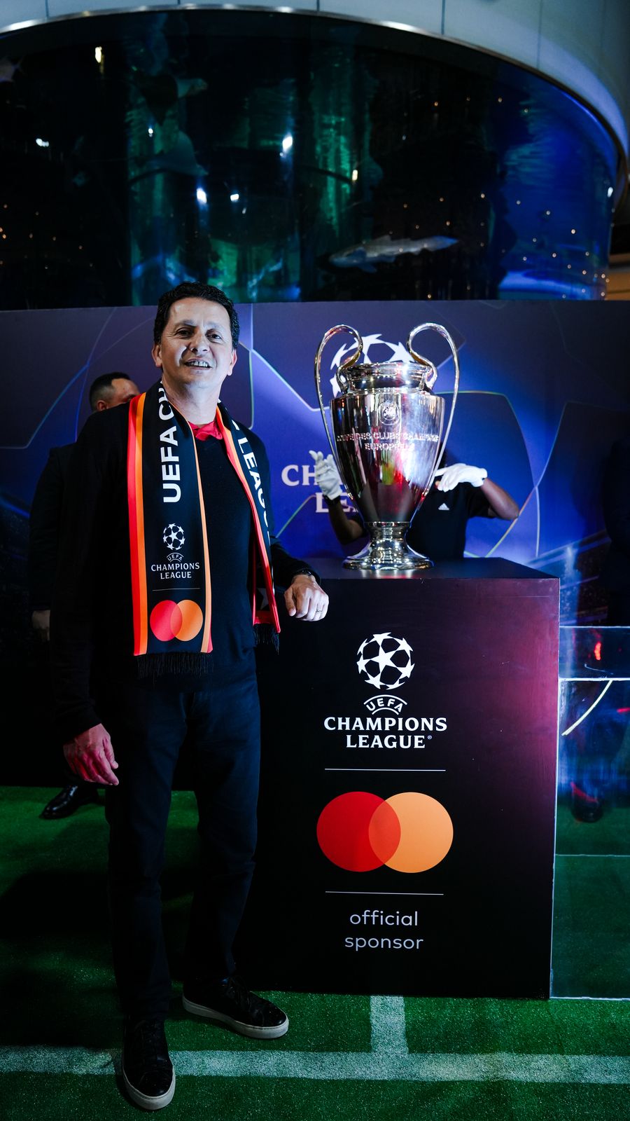 Mohamed Benomar, Country General Manager, North West Francophone Africa at Mastercard with the UEFA Champions League Trophy at Morocco Mall to mark the inaugural UCL Trophy Tour in Morocco
