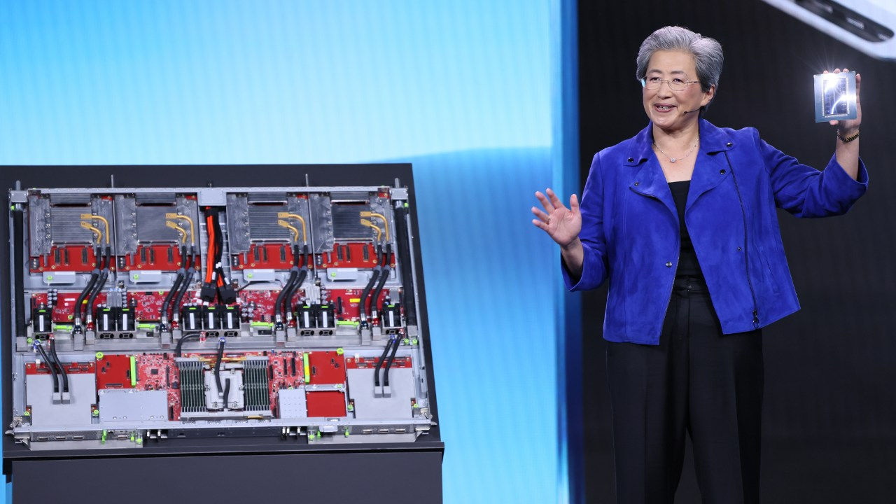 AMD's Linda Su with a display of chips. 
