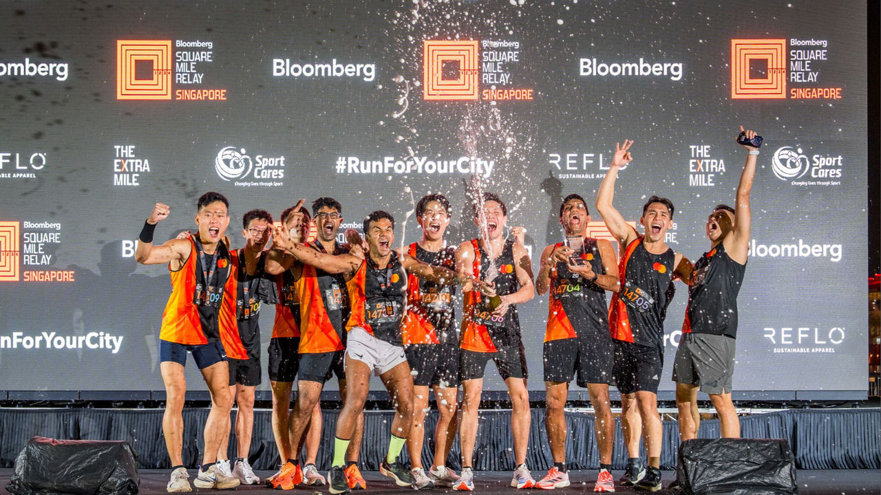 Mastercard runners celebrating their 3rd place win at the Singapore Bloomberg Square Mile Relay on 24 Oct 2024. 