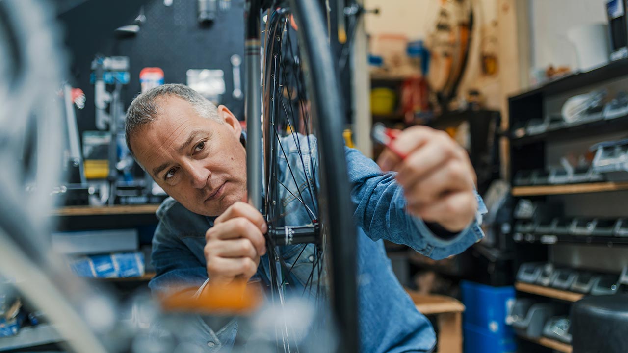 Fixing bike at a bicycle shop.