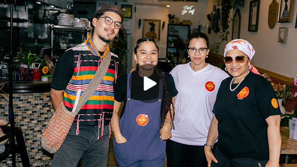 group of people in a restaurant standing