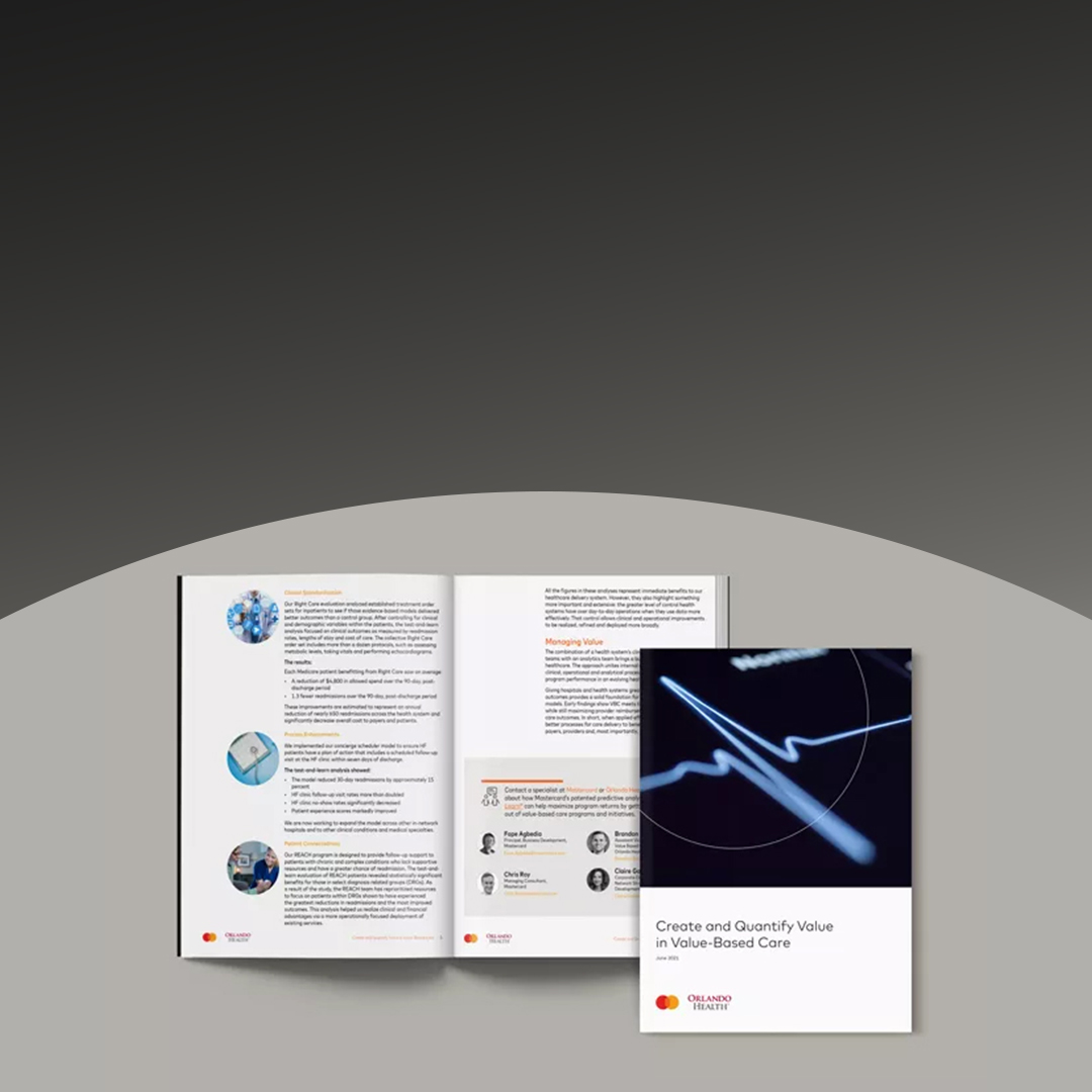 Open booklet with articles and images on left and a cover on right showing a heartbeat line.
