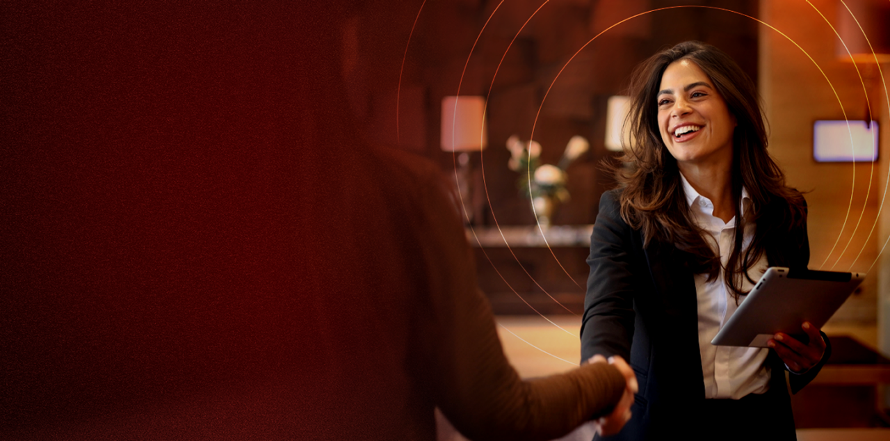 Lady in black blazer doing handshake