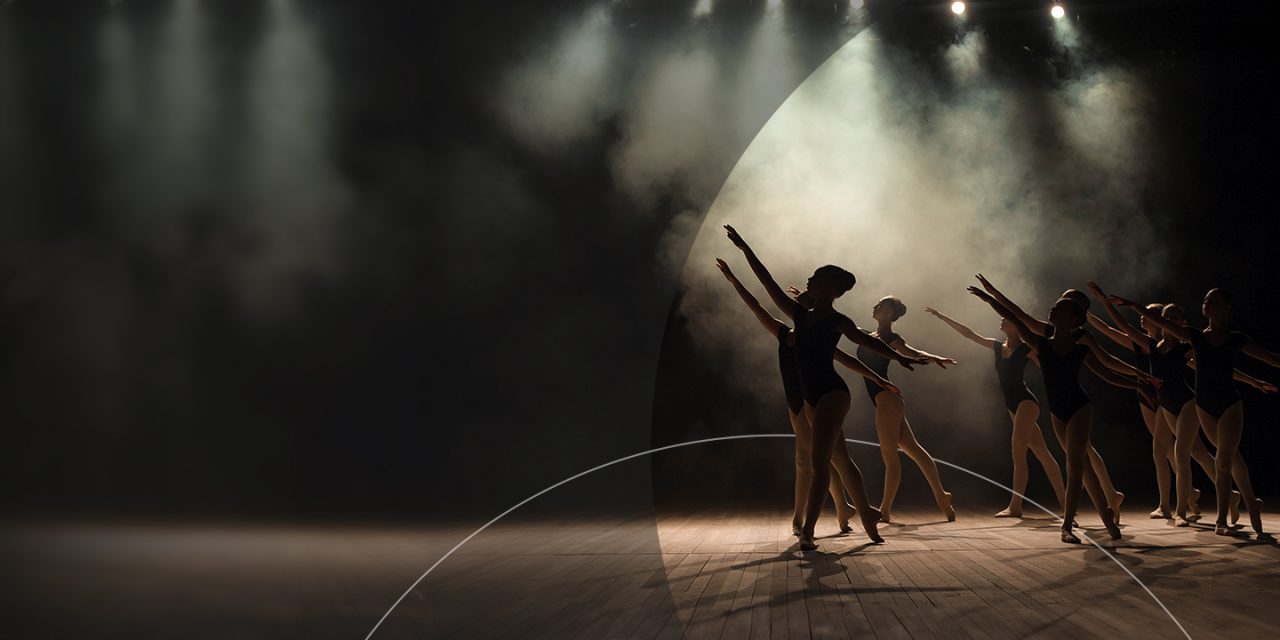 A group of women dancing on the stage