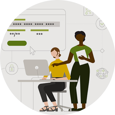 Two colleagues working together at a computer.