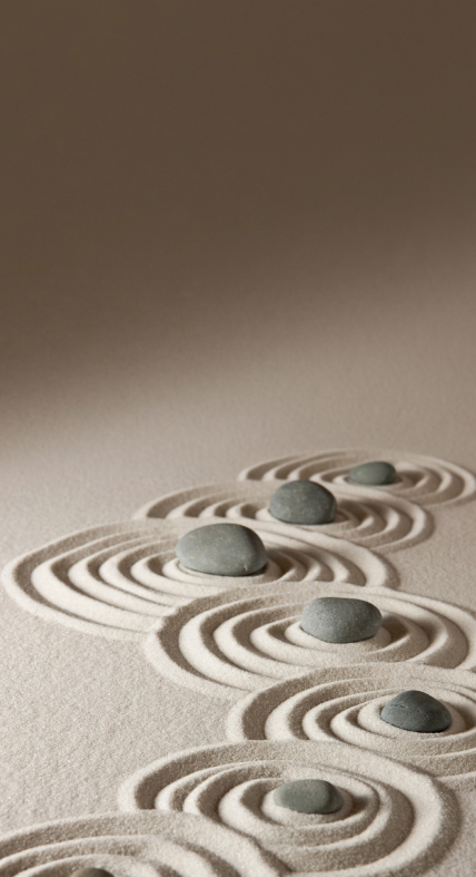 Stones in circles in the sand