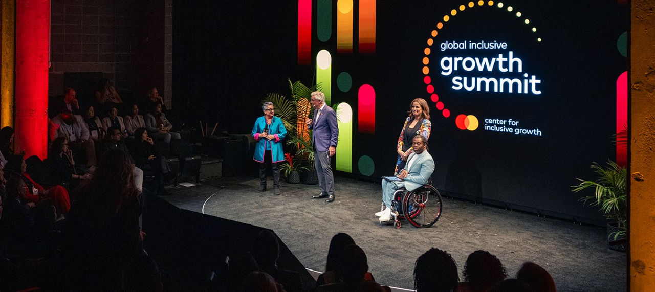 Shamina Singh, Jon Huntsman, Andrea Veiera and Ade Adepitan on stage at the Global Inclusive Growth Summit. 